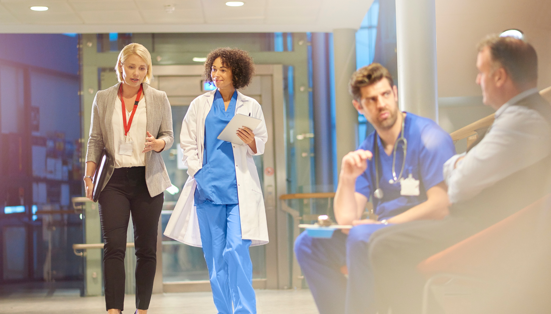 A pharmaceutical sales representative meeting with a healthcare professional